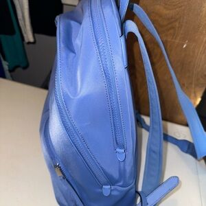 Kate spade light blue backpack, very roomy, only carried a couple of times